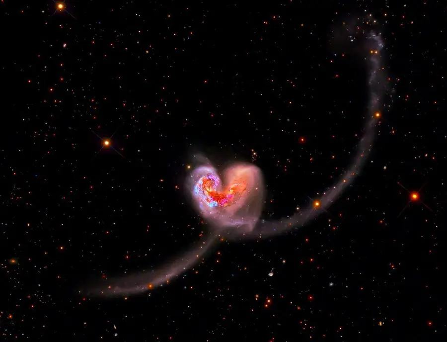 Galaxias en colisión con largas colas de estrellas en el cosmos